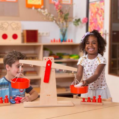 Children Playing With Educational Wooden Toy